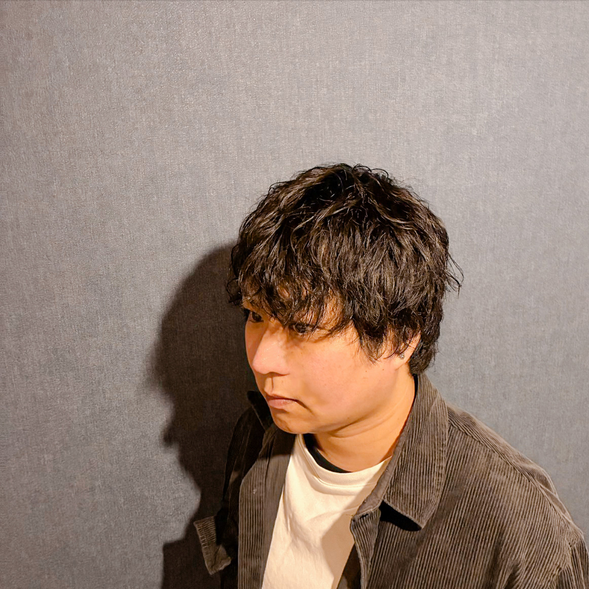 TK BASE代表の横顔写真